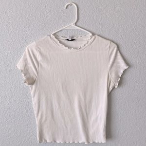 White lettuce rimmed mid length t-shirt